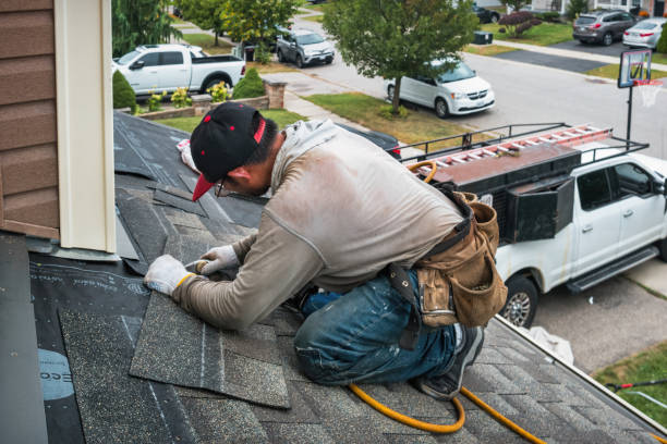 Professional Metal Roofing technician working in Ames, TX
